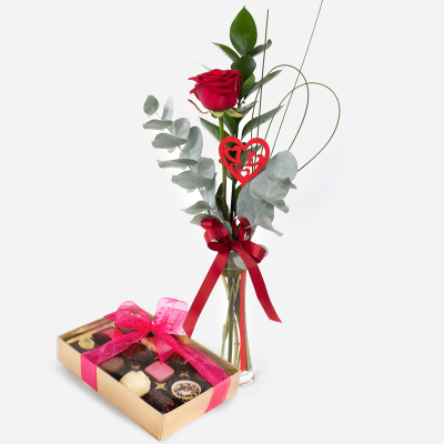 A Little Treasure & Chocolates - Leave a lasting impression with this single red rose, presented in a glass vase. Handmade & hand-delivered with chocolates to the one you treasure. 
