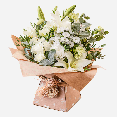 Evelyn - A fabulous collection of white and cream flowers make this the perfect gift. This bouquet will be hand delivered by the local florist.